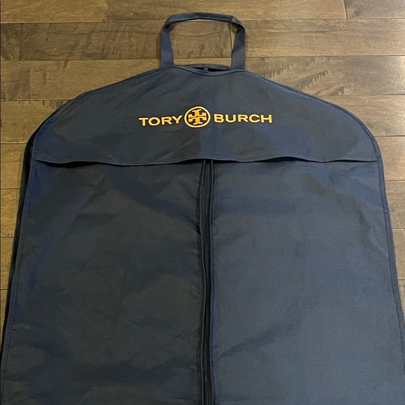 Tory Burch Handbags - Tory Burch Blue Garment Bag with Gold Logo